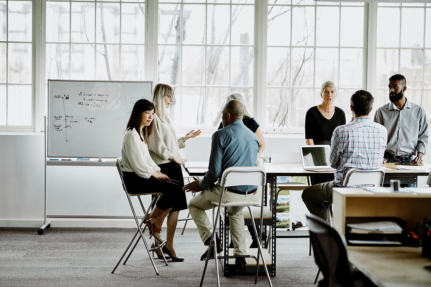 team of people at the office learning Mental Health First Aid 