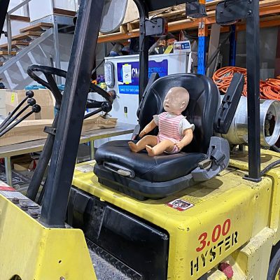 cpr annie on a forklift having fun before class. At FAST Training Australia we like to have fun and engaging classes