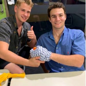 2 teenagers managing a bleed with a sock youth safety and mental health awareness