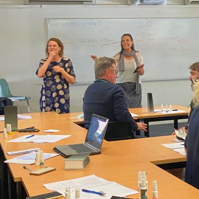 Facilitating Workplace Wellbeing trainers teaching workplace wellbeing