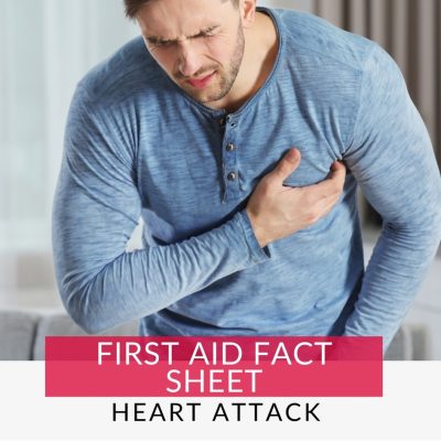 Man in blue long-sleeve clutching his chest due to a heart attack, Learning Heart attack first aid can save a life