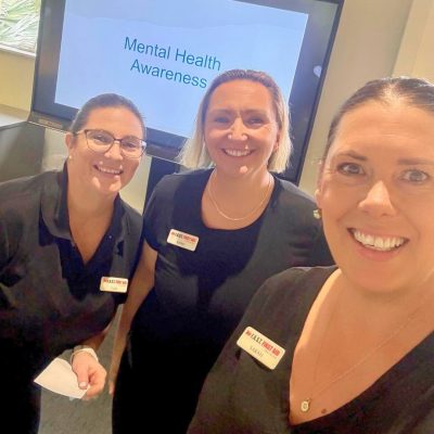 3 staff from fast training australia ready to teach employee wellbeing programs Brisbane