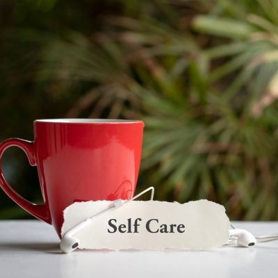 workplace micro self care strategies coffee cup and sign promoting micro self care strategies