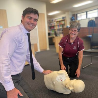 2 staff learning workplace cpr, practical and hands on classes