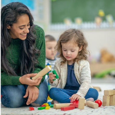 child and adult playing and the importance of how to identify young people at risk