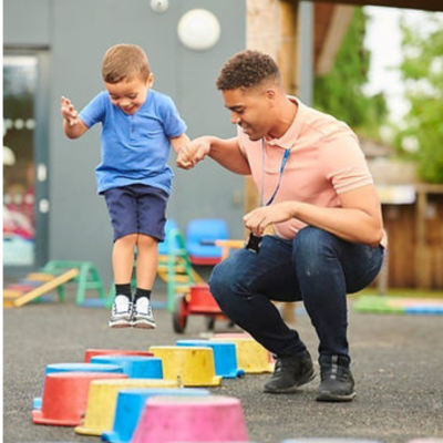 Child at Risk Refresher man and child playing after doing child at risk refresher training