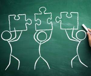 jigsaw puzzle showing team work