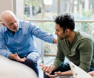two workers showing clear and open communication and empathy