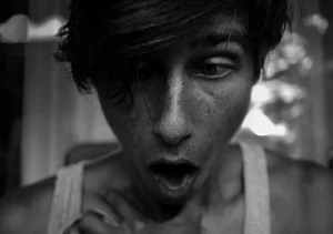 man having trouble breathing