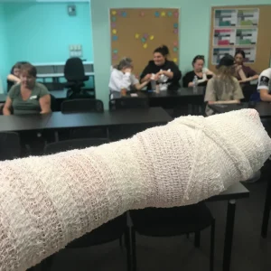 Arm bandaged first aid and cpr course ipswich