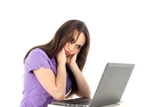 woman looking depressed at work