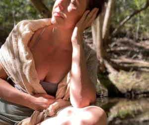 woman-laying-on-grass-recovery selfcare strategies