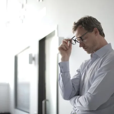 Man appearing distressed, workplace stress