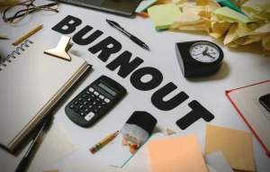 an image of a clock identifying the risk of employee burnout is and how important workplace training is