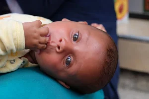 A "good" baby may just have stopped vying for your attention - they learn at an early age to conserve their energy.