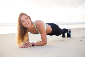 lady-doing-a-plank self care strategies