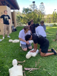 young-teens-learning-first-aid summer safety tips