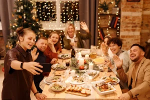 Group of people eating Christmas dinner Silly Season Safety