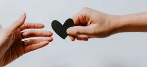 Sharing a black heart card shape, self care strategies