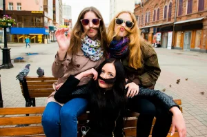 friends goofing around, staying in connection is good for your mental health. workplace mental health training can give your staff the skills and tips in how to create a better work life balance. 